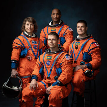 artemis 2 crew members NASA astronauts Christina Hammock Koch, Reid Wiseman (seated), Victor Glover, and Canadian Space Agency astronaut Jeremy Hansen left to right
