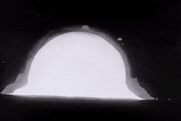 mushroom like cloud of the first nuclear explosion named Trinity test