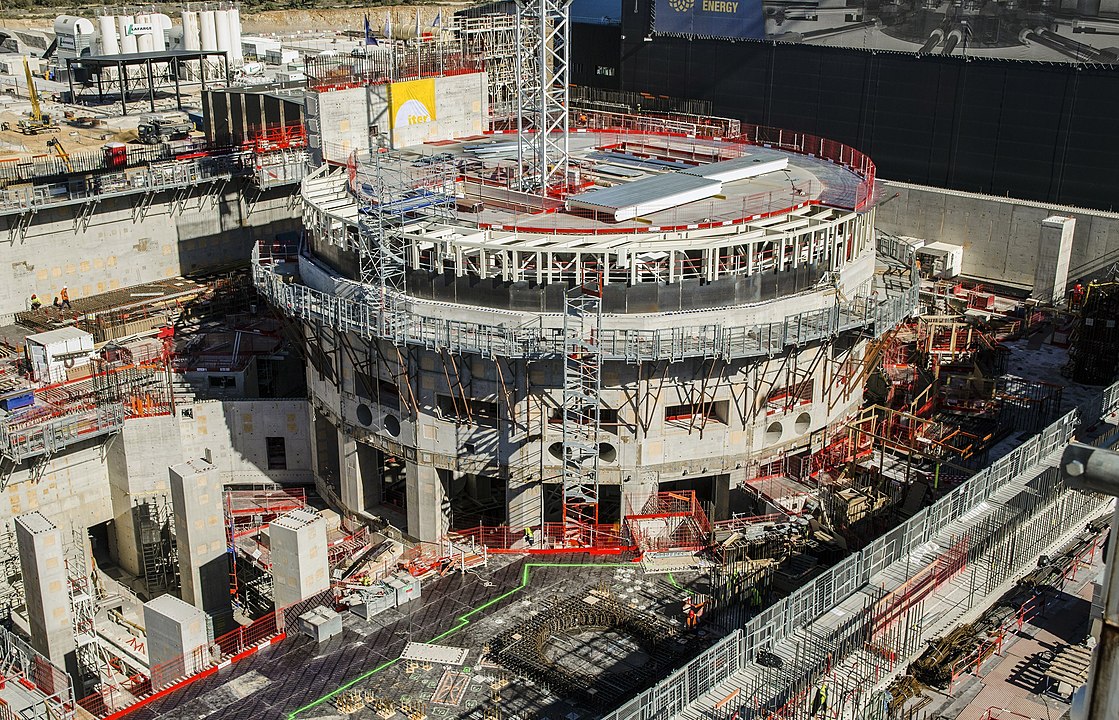Construction site of a cylindrical building, the fusion reactor site of The International Thermonuclear Experimental Reactor (ITER)