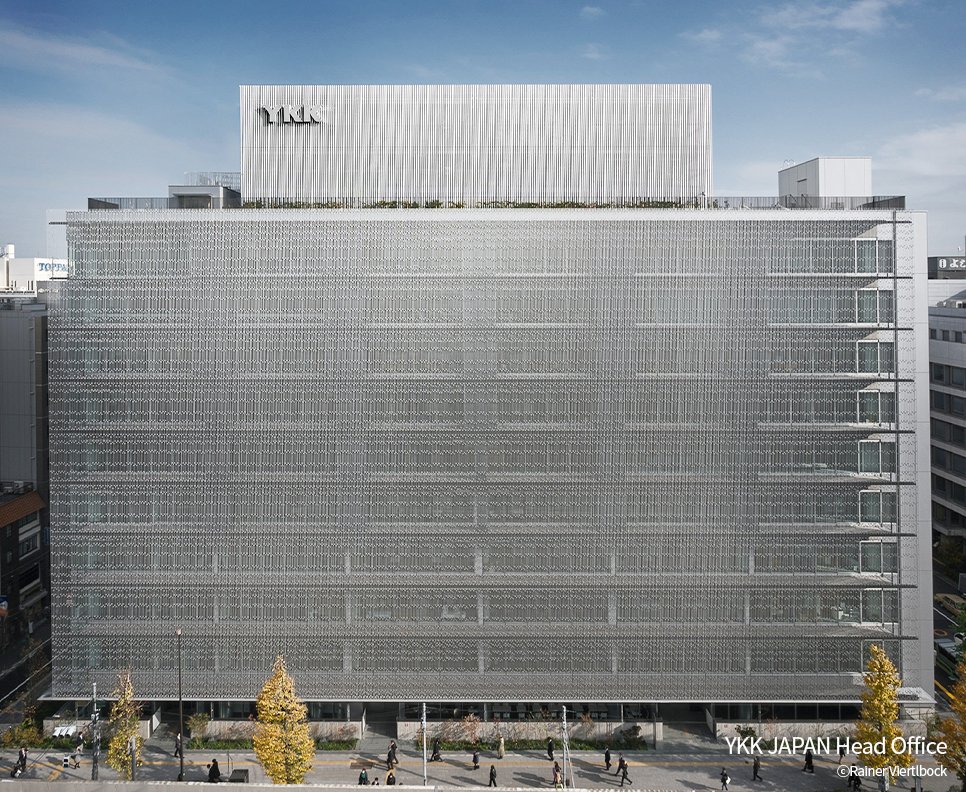 big silver colored building of YKK group